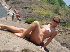 Beauty posing nude on the beach