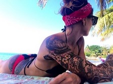 Perverse tattoo ex-girlfriend enjoy in bikini on the beach