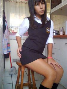 Sexy Schoolgirl at home.